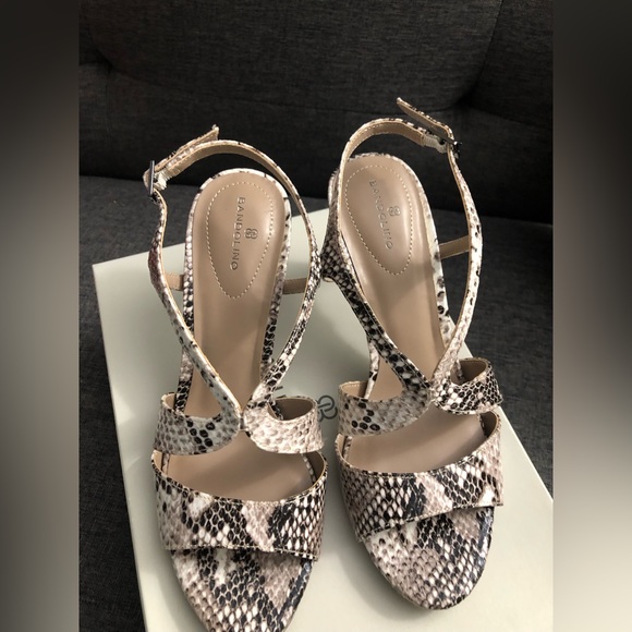 Bandolino strappy 3”heels with snake print design. - Picture 1 of 5